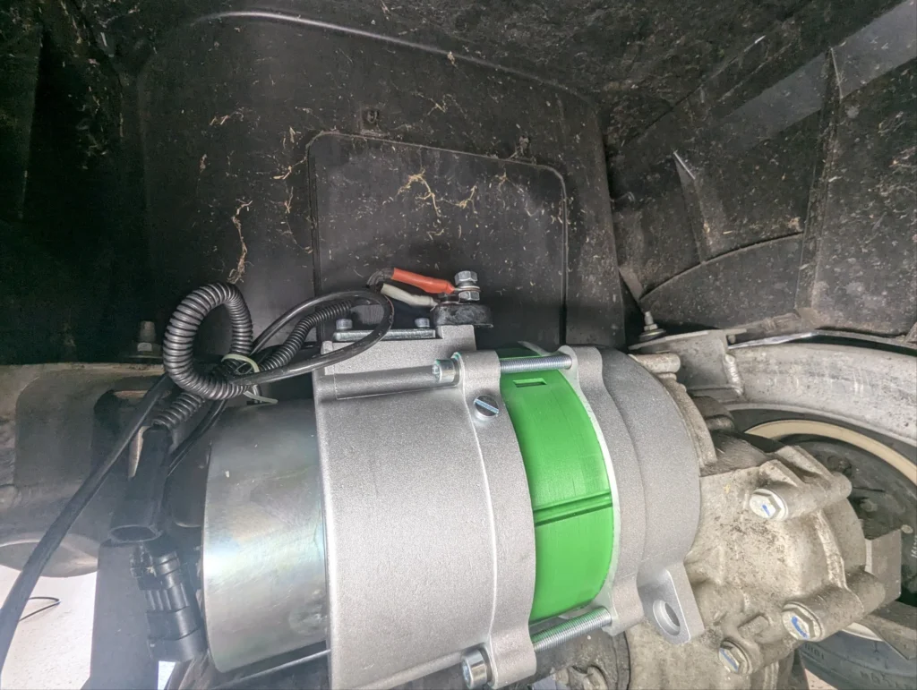 Mounting the new engine into the bay for this Club Car Precedent Navitas Install.
