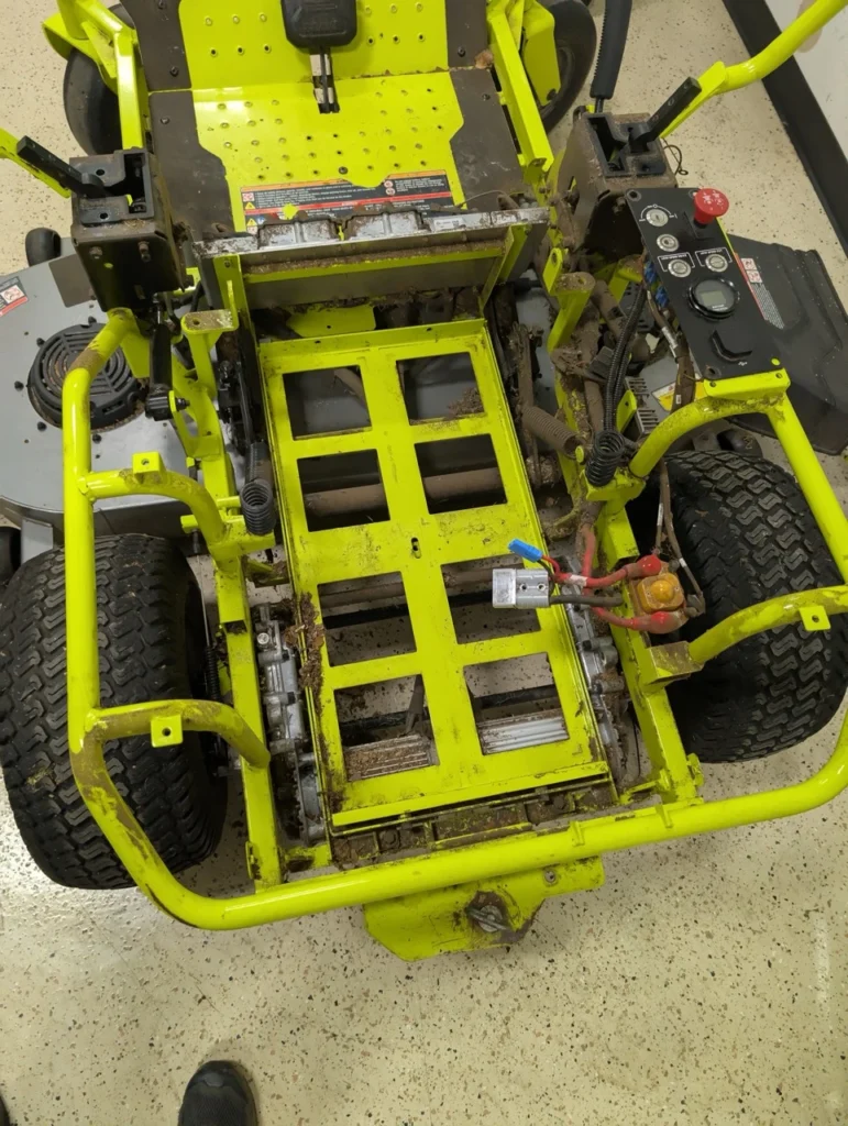 These pictures depict the BEST Battery team performing a Ryobi Zero-Turn Mower Battery Upgrade on a ZT540e model zero-turn mower.