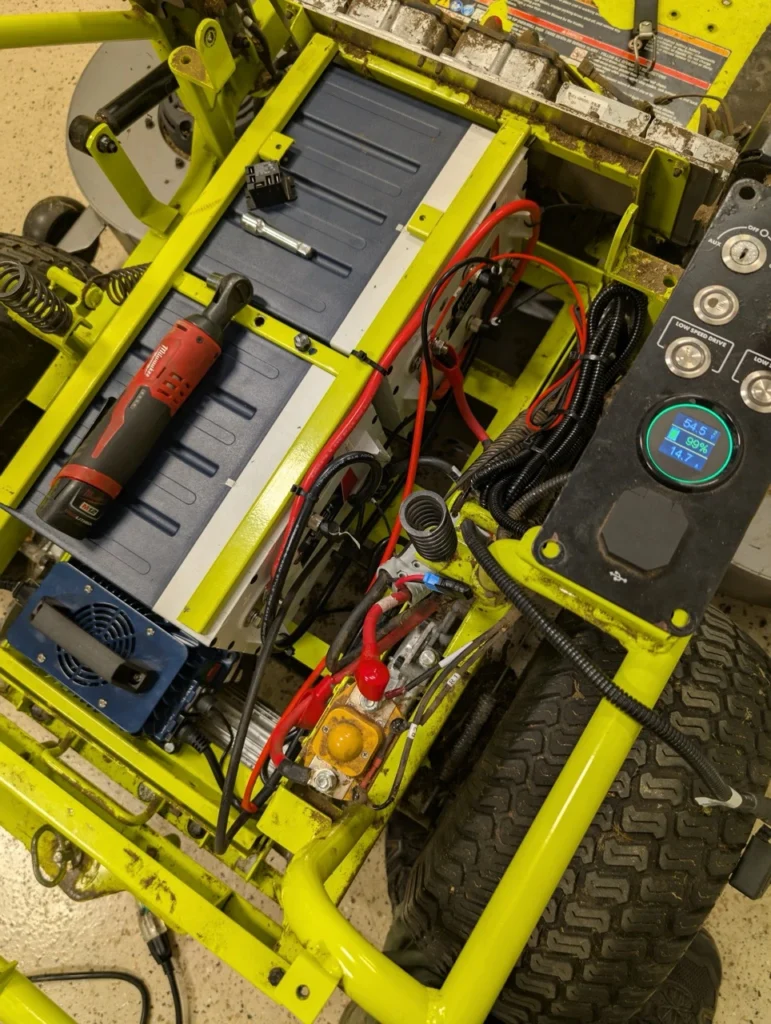 These pictures depict the BEST Battery team performing a Ryobi Zero-Turn Mower Battery Upgrade on a ZT540e model zero-turn mower.