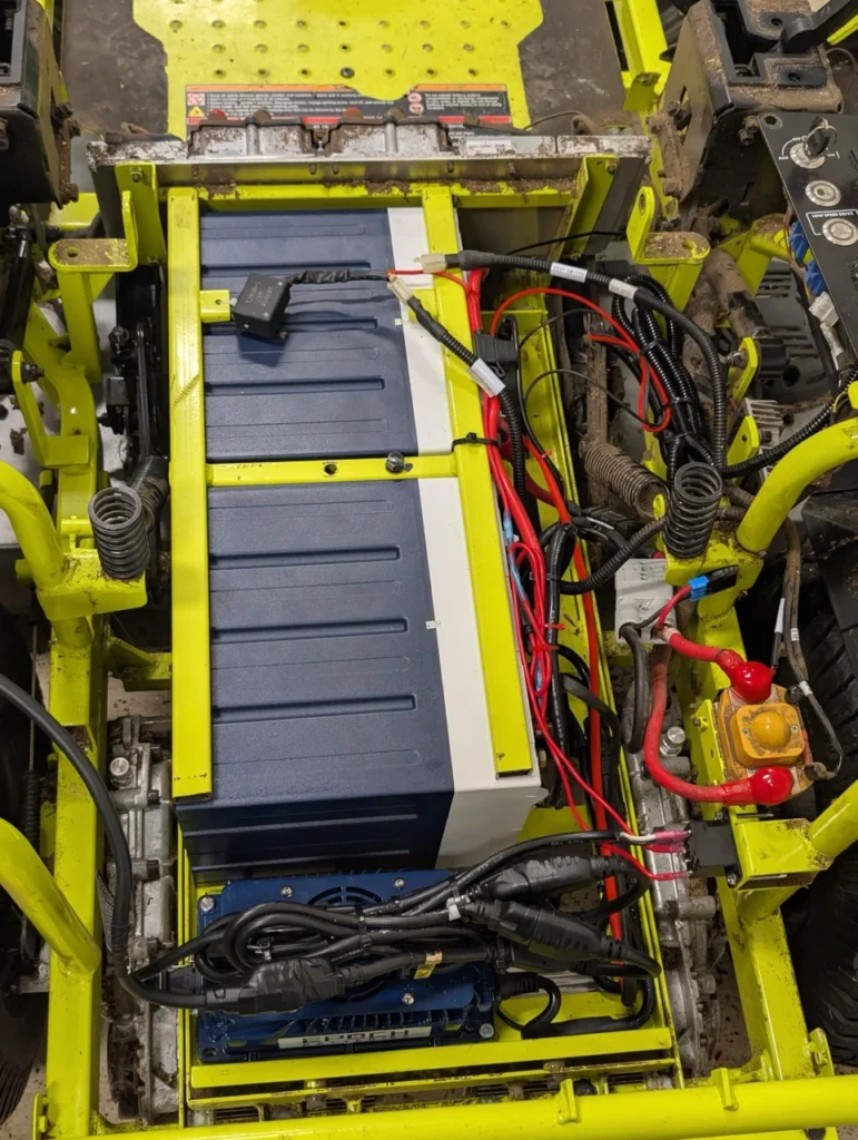 These pictures depict the BEST Battery team performing a Ryobi Zero-Turn Mower Battery Upgrade on a ZT540e model zero-turn mower.