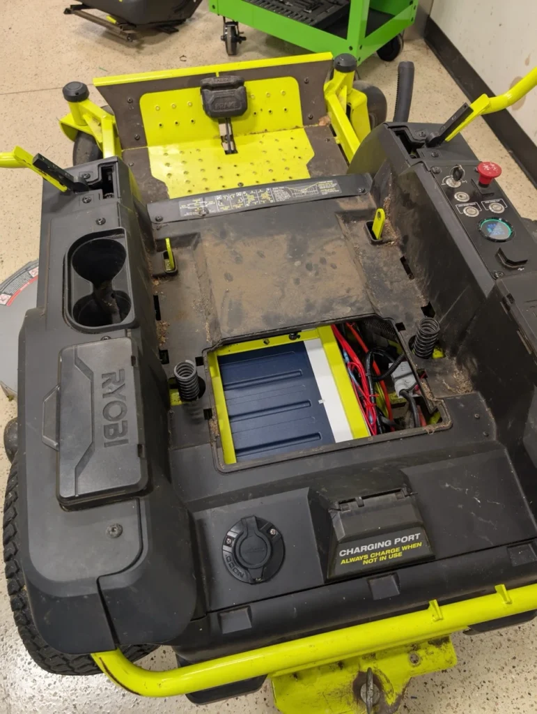 These pictures depict the BEST Battery team performing a Ryobi Zero-Turn Mower Battery Upgrade on a ZT540e model zero-turn mower.