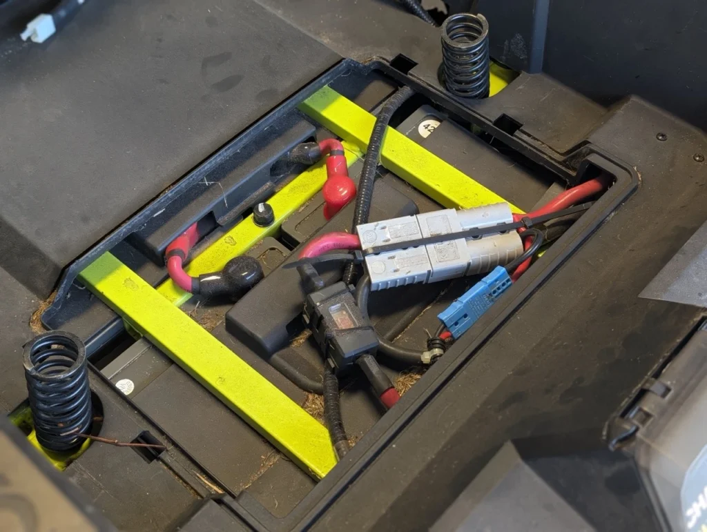View of the battery compartment from under the seat.